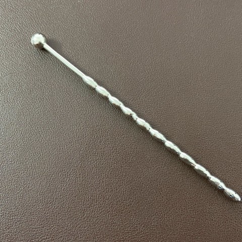 Que inox kích thích niệu đạo